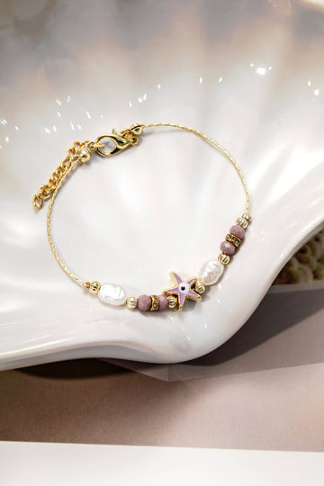 Bracelet decorated with pearls and semi-precious stones with a starfish and Turkish eye in 18k gold-plated Cooper-Bracelets-Turquia